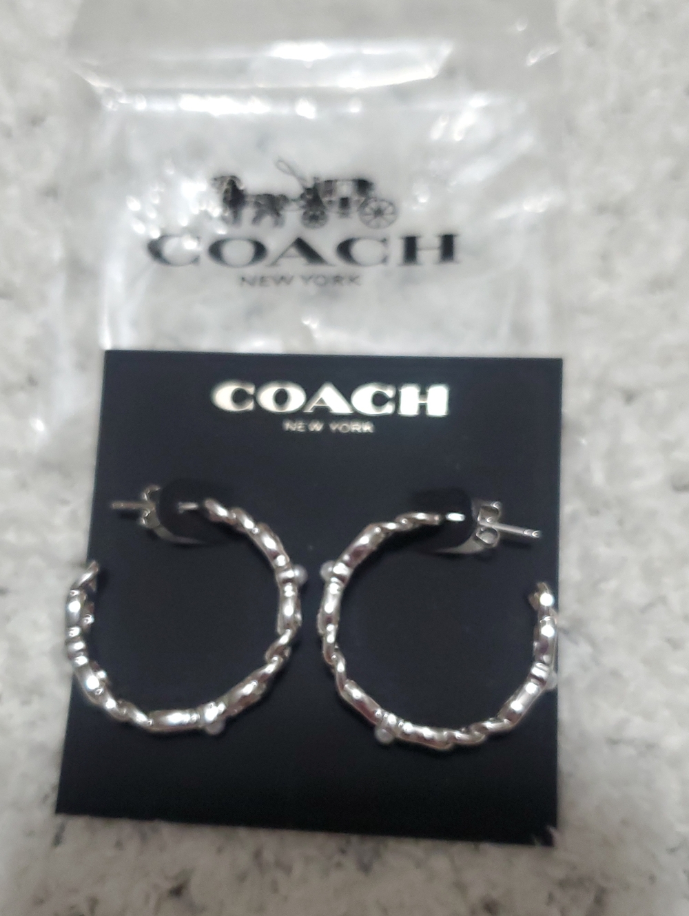 COACH Silver Twisted Hoop Earrings